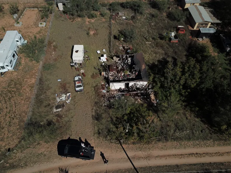 Burned house demolition and cleanup in Hereford, AZ, before, from above